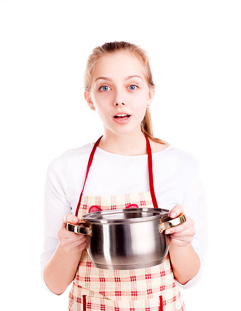 istock Chef hold pan with wonder face isolated 527543472