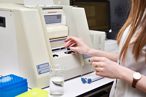 istock Analysis of substance in biochemistry laboratory 527543716