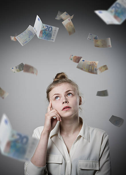 istock Girl in white and Euro. 527544306