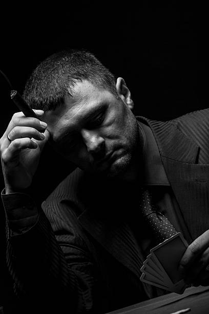 istock Male gambler playing poker. 527544602