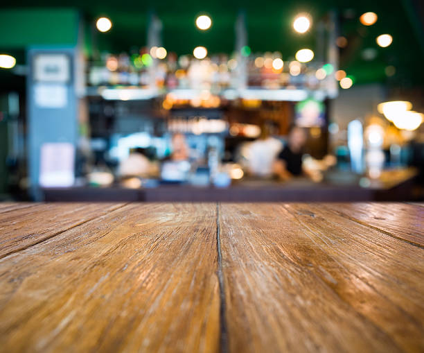 istock Table top Counter Bar with Blurred Restaurant cafe Background 527544672