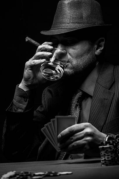 istock Male gambler playing poker. 527544804