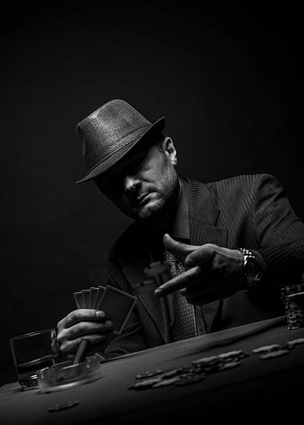 istock Male gambler playing poker. 527544884