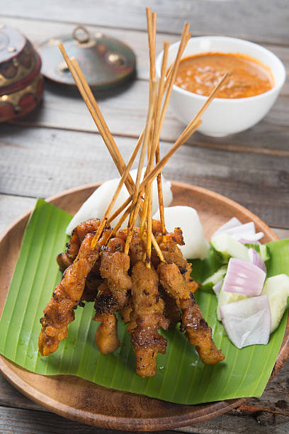 istock delicious malaysian satay with curry sauce 527545888