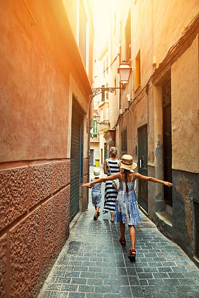 istock Family visiting mediterranean town. 527548002