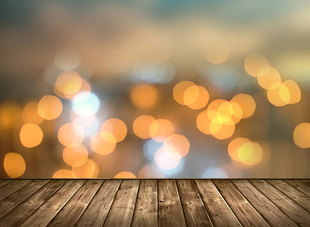 istock Wooden table and Bokeh light background. 527550920
