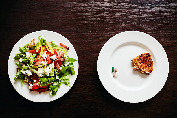 istock salad with pills and meat 527550980