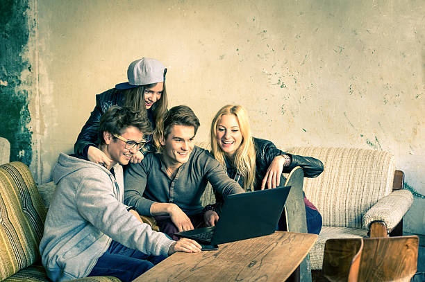 istock Group of young hipster best friends with computer laptop 527554053