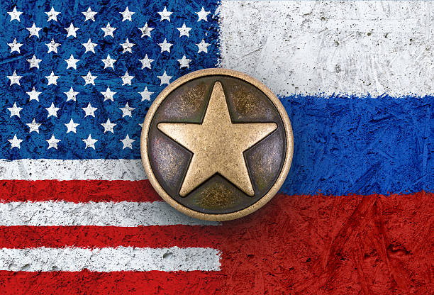 istock Bronze star on USA and Russian flags in background 527554947