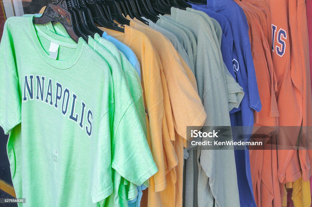 Annapolis T-Shirts An array of Annapolis T-Shirts in several colors are displayed on a rack outside of a souvenir shop in Annapolis. Annapolis Stock Photo