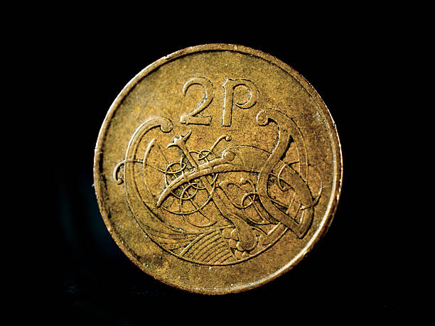 istock Used Irish Coin Isolated 527556831