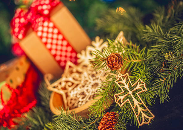 Rustic simple Christmas ornaments with pine tree and gifts