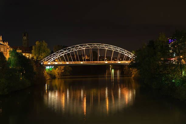 istock Metal bridge in Bamberg at night 527558217
