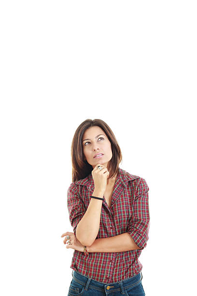 istock Thoughtful woman looking up and having an idea 527568849