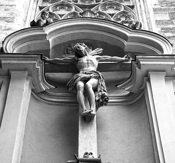 istock crucifix outside Minoritenkirche church 527571129