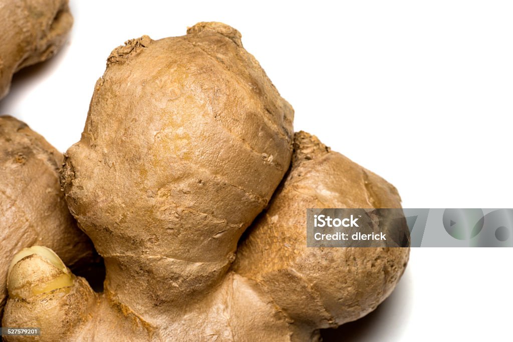 Seasonings: Ginger Root Raw ginger root tp be used for seasoning food.  Sony A99 camera with 70mm macro lens. Ginger - Spice Stock Photo