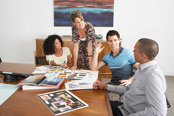 istock Businesspeople In Meeting At Conference Table 527580217