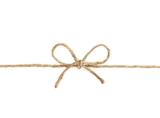 string ou ruban attaché dans un noeud isolé - isolated on white bow gift homemade photos et images de collection