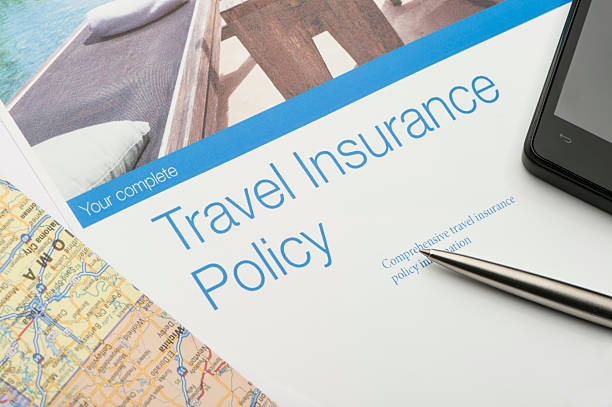 Travel insurance policy document with paperwork and technology. Travel insurance policy document with paperwork and technology. There is an image of a tourist resort with a swimming pool which adds to the peace of mind concept. There is also a mobile phone, map, and pen. Image featured on the brochure is in my portfolio 20943516 pool at the crook stock pictures, royalty-free photos & images