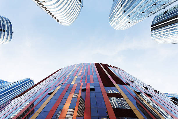 istock up looking the modern business office building exterior and sky 527586537