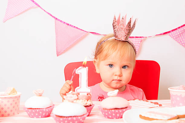 istock little princess at first birthday party 527586807