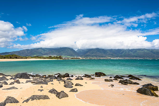 View of Kahului from Kanaha Beach in Maui stock photo