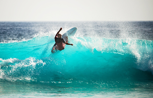 Surfer on waves.