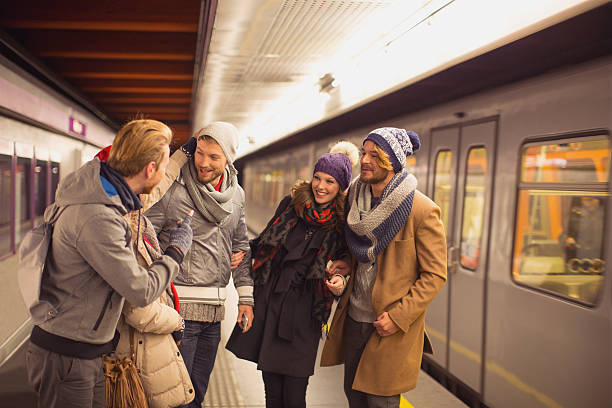 istock Friends at subway station waiting for train. 527618747