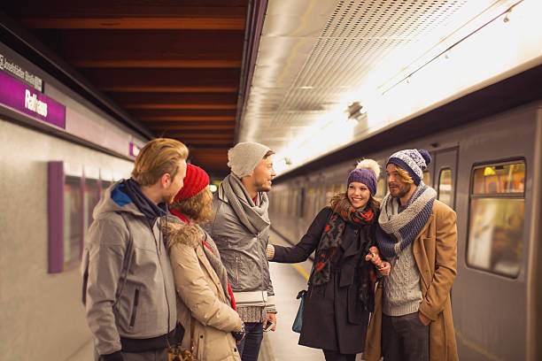 istock Friends at subway station waiting for train. 527630929