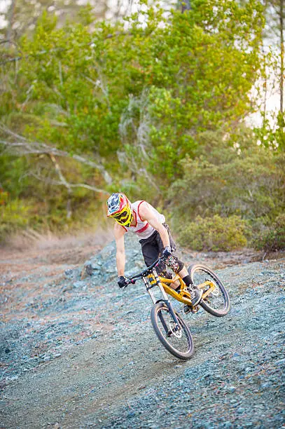 Young man doing bike jump