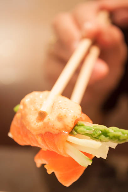 istock Closeup salmon mentai sauce  on white plate 527634427