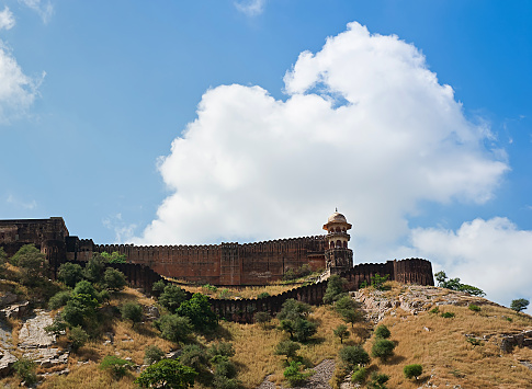Massive fortified walls of Jaigarh Fort on a hill above Amber Fort. Jaipur, Rajasthan, India.