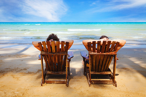 couple resting on the beach