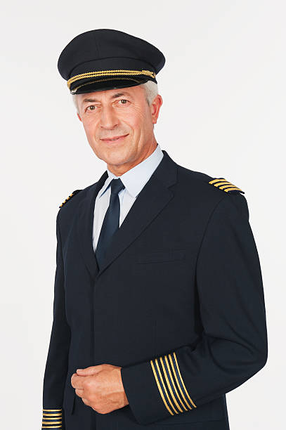 Close up of senior flight captain on white background stock photo