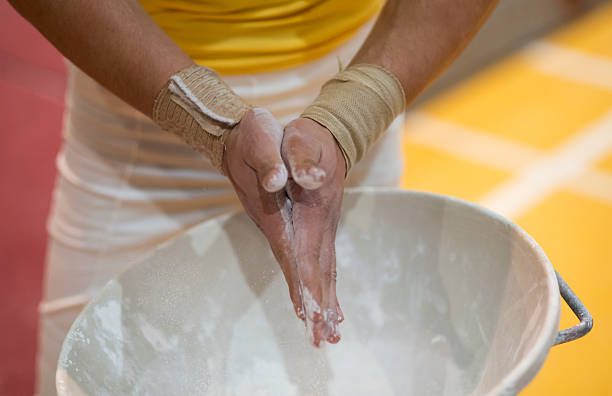 istock gymnast with magnesium chalk 527654877