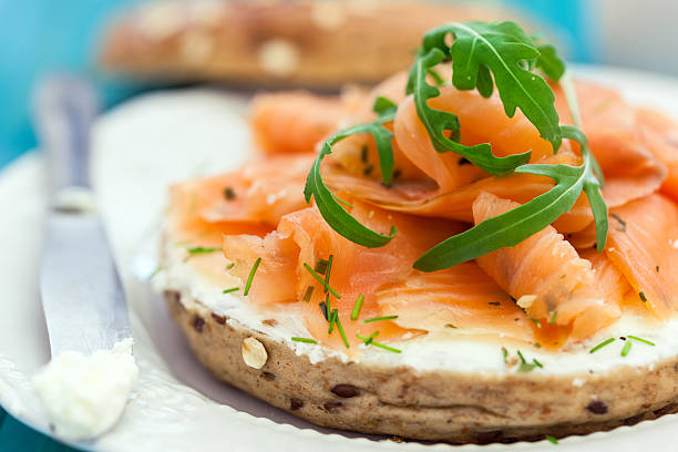 Smoked Salmon Bagel Smoked Salmon with cream cheese on a bagel smoked salmon stock pictures, royalty-free photos & images