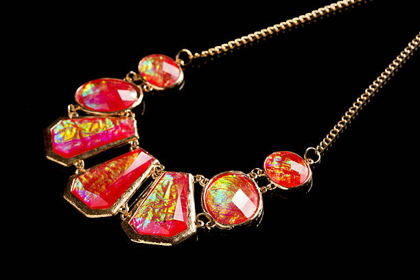 istock red necklace on a black background. gems 527661408