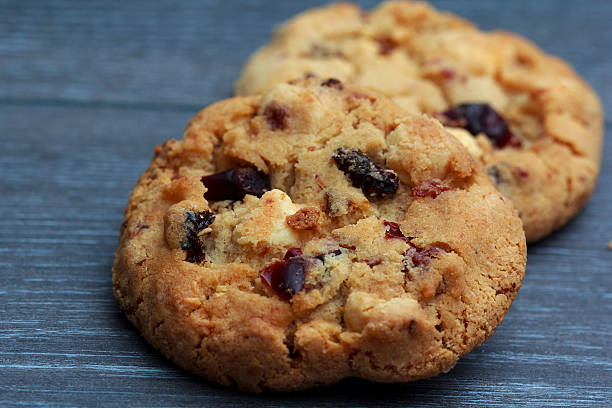 istock White chocolate and cranberries cookies on rustic wooden table 527664100