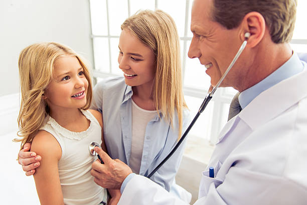 istock At the pediatrician 527670956