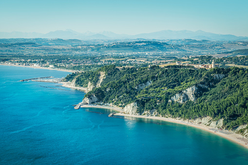 Village of Sirolo and green coasts to the sea. Marche, Italy.