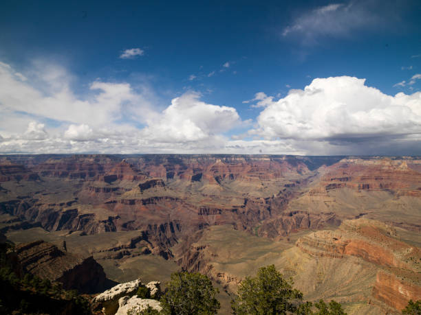 Grand Canyon National Park, Arizona, Nevada, USA Grand Canyon National Park, Arizona, USA. Scenic landscape of a famous place and family road trip tourist vacation travel destination. Horizontal vista of eroded, awe-inspiring sedimentary rock formation geology of desert cliff extreme terrain. Tranquil, majestic wilderness area with copy space and no people.  cape royal stock pictures, royalty-free photos & images