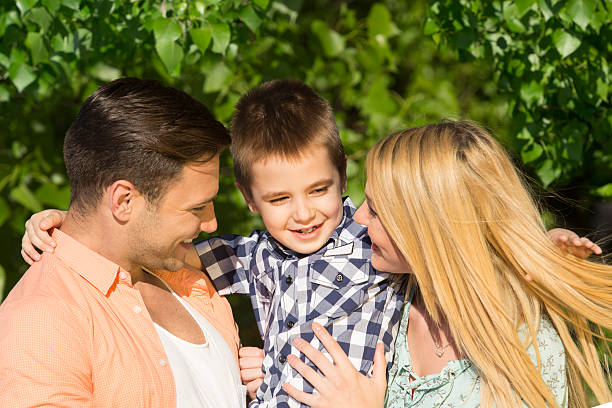 istock Happy family outdoors on a sunny day 527672376