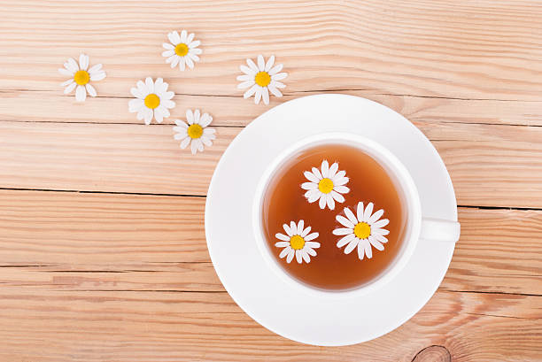 istock Cup of tea with chamomile. 527672779