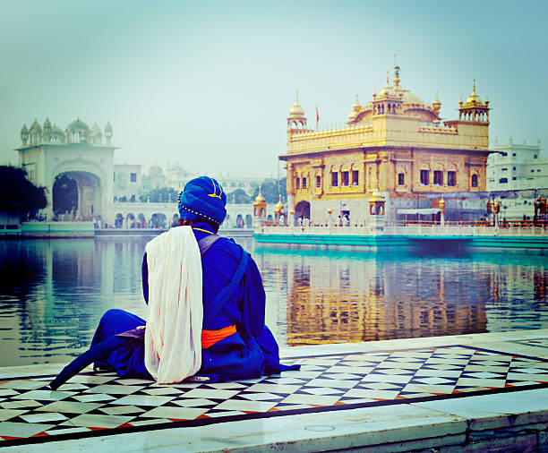 istock Unidentifiable Seekh Nihang warrior meditating at Sikh temple 527672815