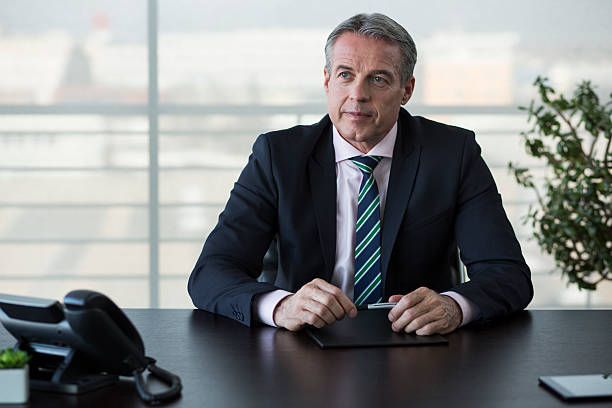 istock Businessman sitting at office 527673122