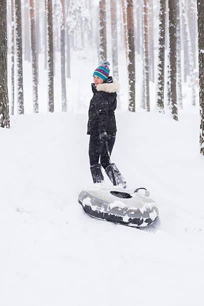 istock Woman outdoors at winter forest 527673349