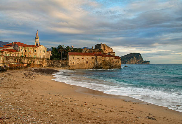 istock medieval city and sea in sunset 527674657