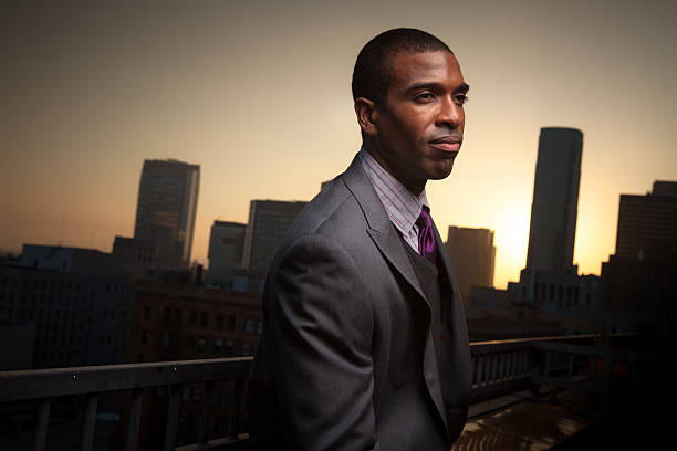 istock Pensive Young Professional Looking Over Downtown District 527675069