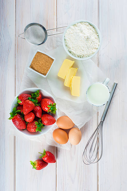 Ingredients to cook an strawberry cake stock photo
