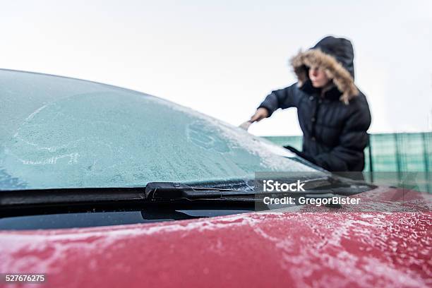 Woman Scraping Ice From Car Windscreen Stock Photo - Download Image Now - Car, Cold Temperature, Snow